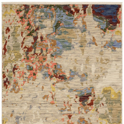8' X 11' Beige Salmon And Tan Abstract Area Rug With Fringe